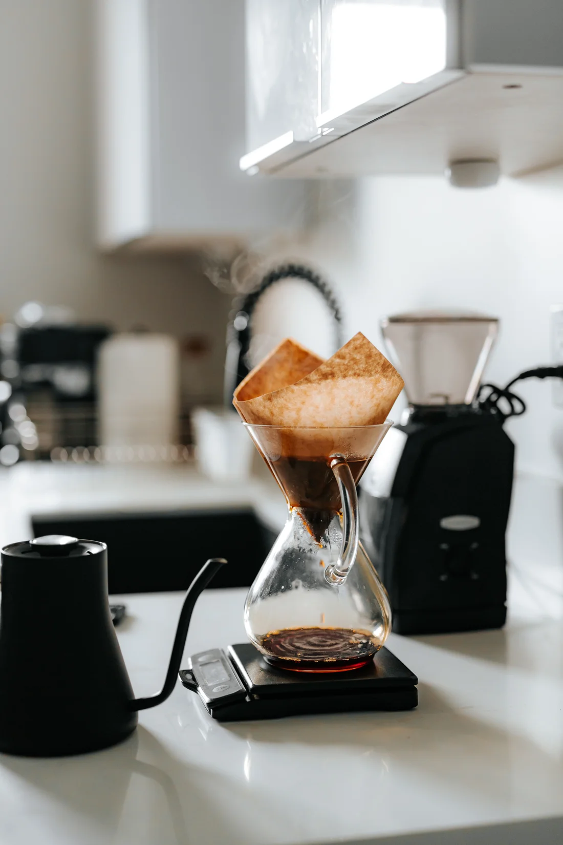 Pour-over coffee brewing in a glass dripper
